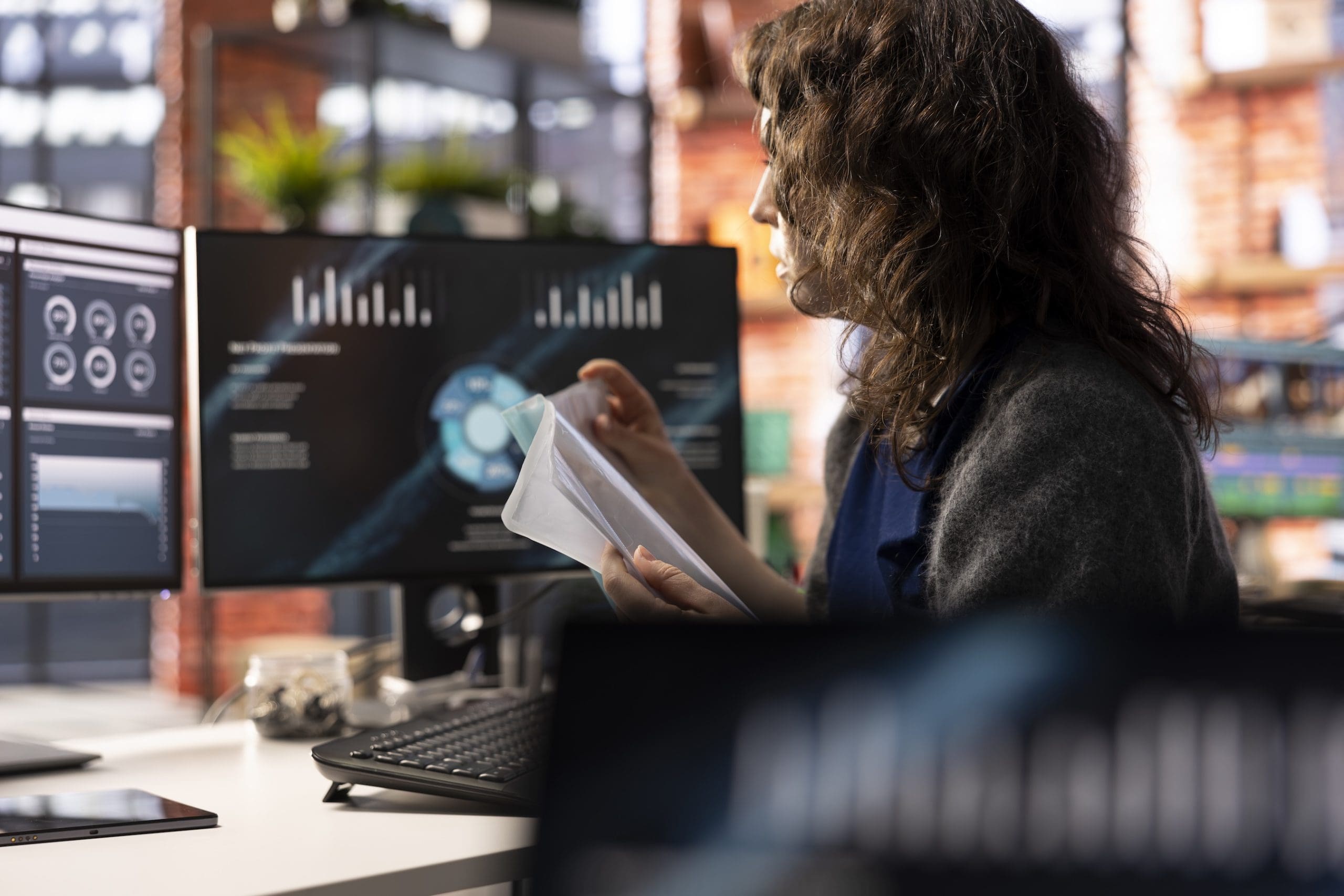 Latina entrepreneur watching business conference