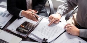 Businessman discussion to explaining document to customer