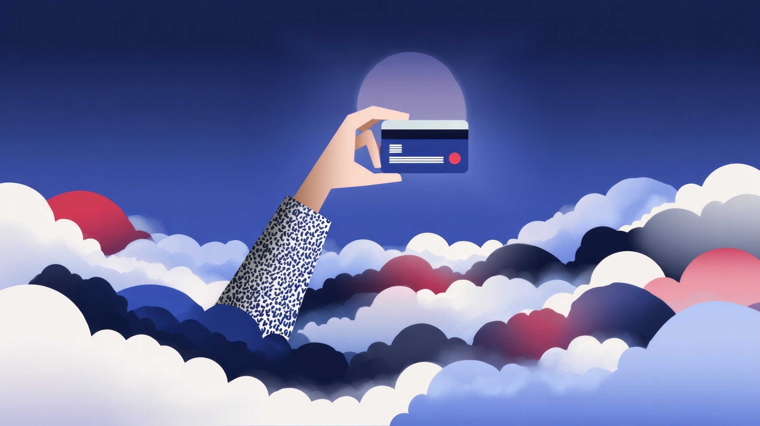 A hand is holding a credit card
