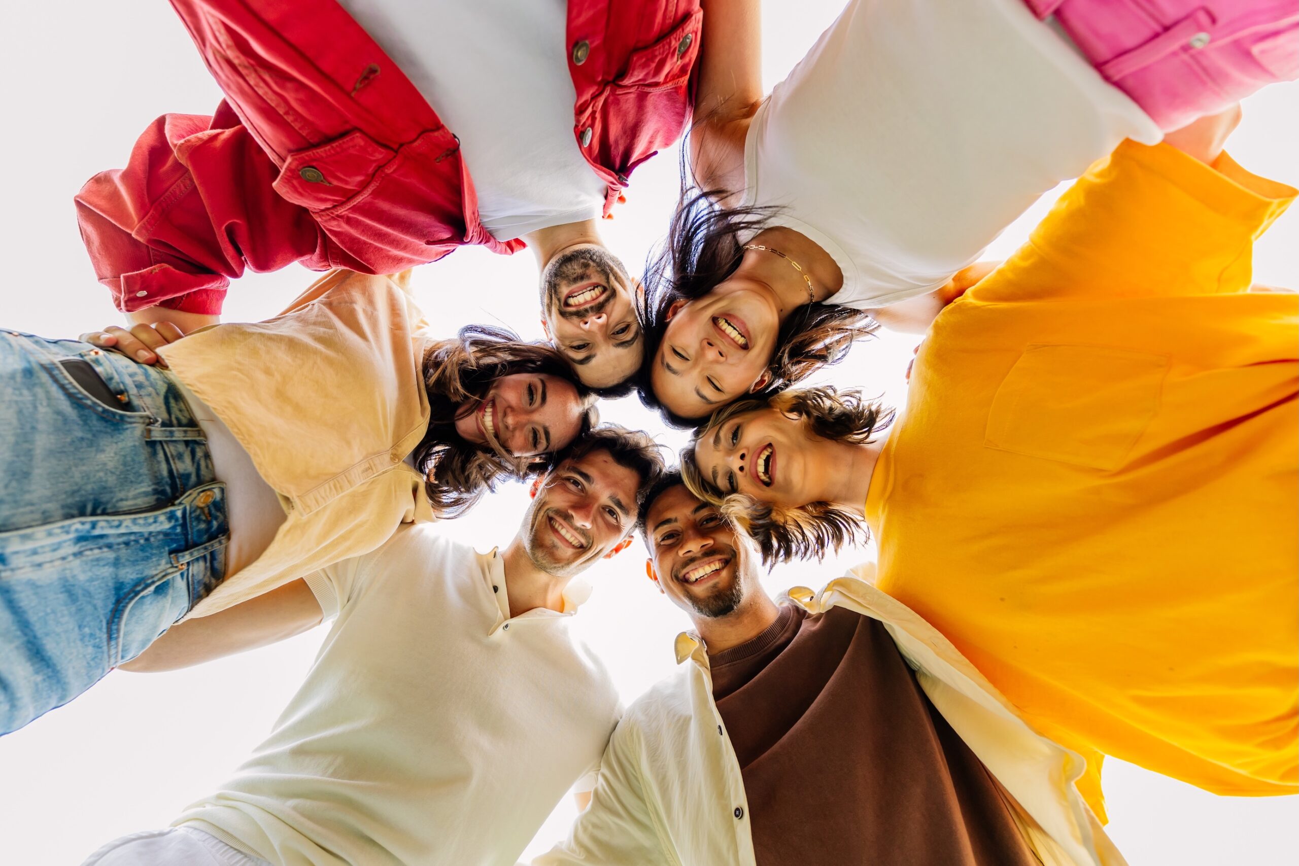 Happy group of young people in circle. Youth community concept