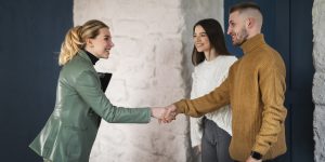 Latina business owner with customers