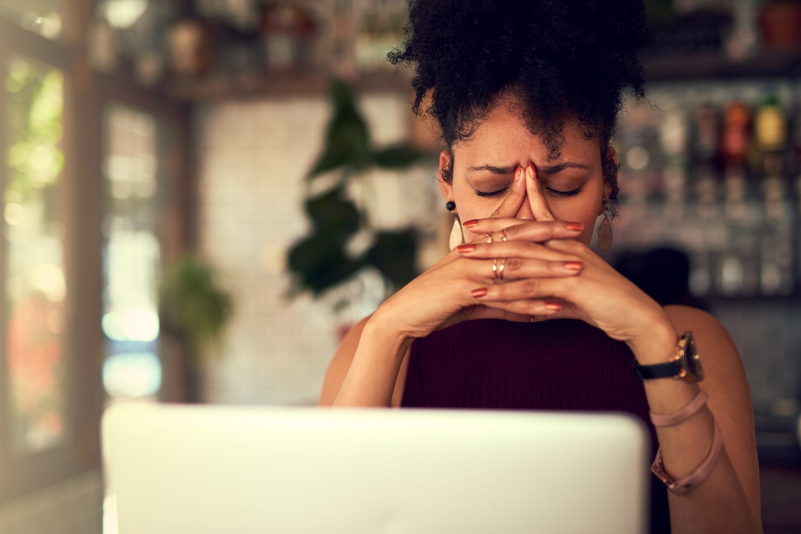 Latina entrepreneur stressed