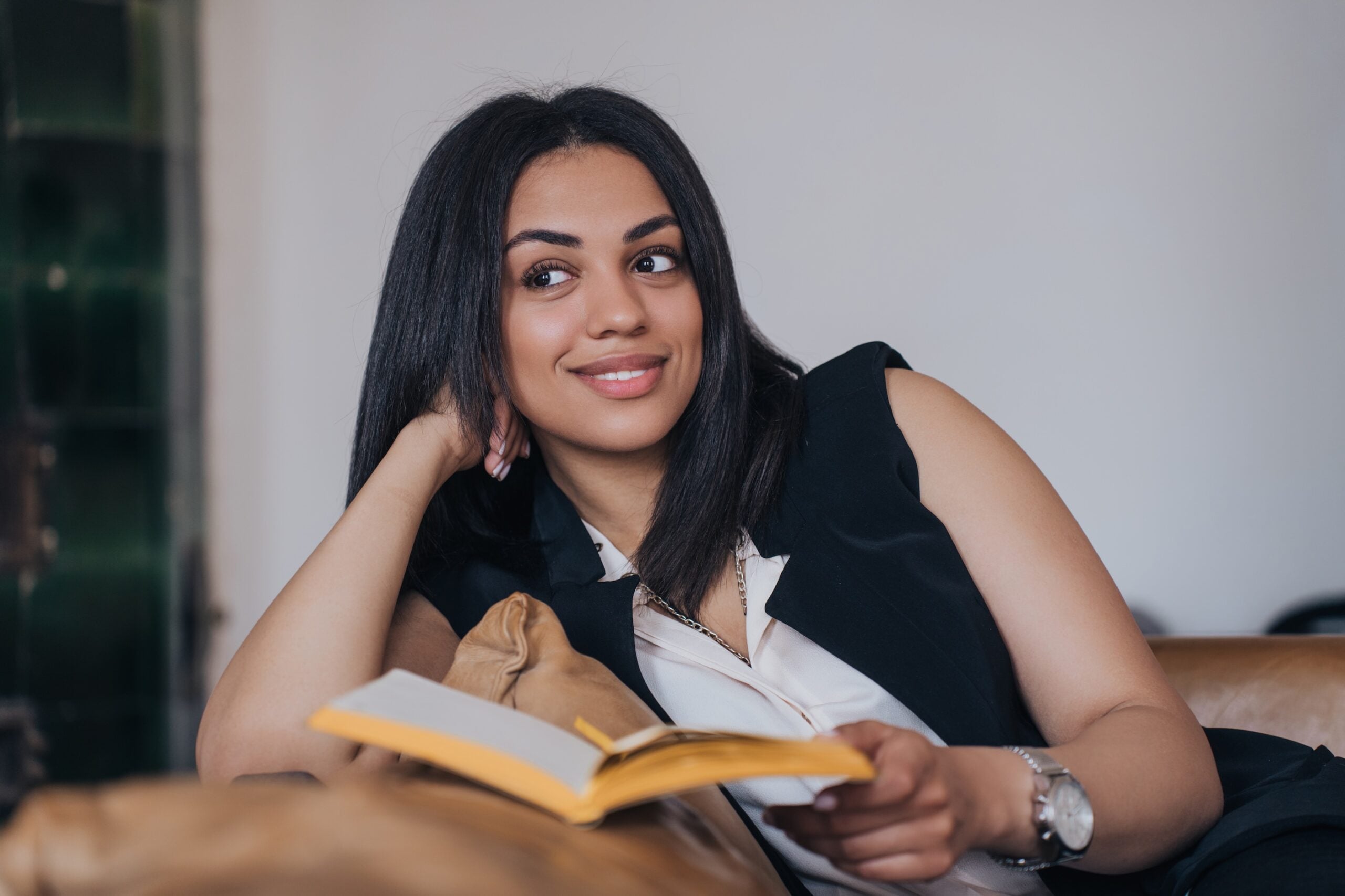 Cheerful Latina , reading book